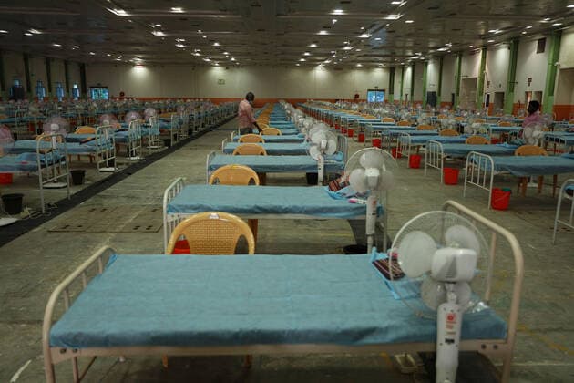 January 7, 2022, Chennai, Tamil Nadu, India: Indian workers install beds at a makeshift COVID-19 coronavirus isolation ward with more than 900 beds inside Chennai Trade Centre in Chennai. StateÃ‚ governments in India are enforcing more severe travel restrictions and partial lockdowns as the country struggles to deal with the third Covid-19 pandemic and rising omicron infections. Chennai India - ZUMAl172 20220107_zip_l172_005 Copyright: xSrixLoganathanx