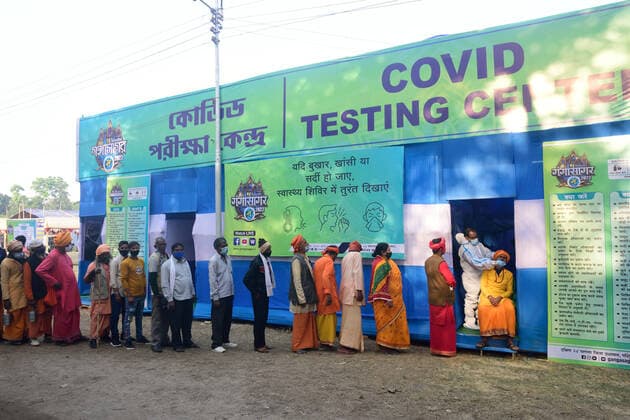 January 7, 2022, Kolkata, West Bengal, India: Monks and pilgrims are being tested for Covid-19 at a Gangasagar Transit Camp before heading to the Gangasagar mela in sagar island. Kolkata India - ZUMAs197 20220107_zaa_s197_040 Copyright: xSumitxsanyalx