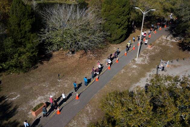 January 7, 2022, Tampa, Florida, USA: People line up for the walk up Covid testing site at Al Lopez Park, 4810 N Himes Ave, on Friday, Jan. 7, 2022 in Tampa. The state is reporting record numbers of Covid infections primarily due to the current wave of the Omicron variant. Testing sites have seen an uptick as well. Tampa USA - ZUMAs70_ 20220107_zan_s70_003 Copyright: xDirkxShaddx