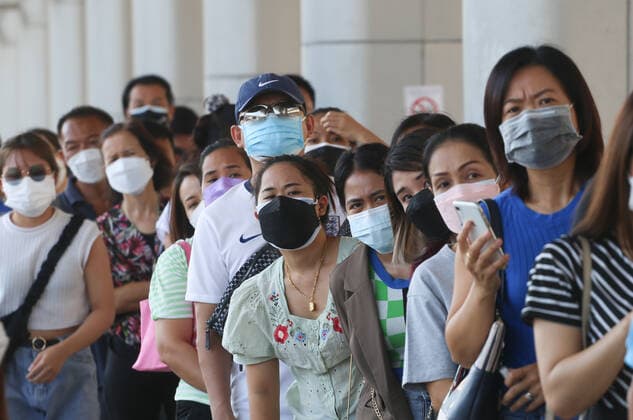 January 8, 2022, Bangkok, Thailand: People wearing facemasks as a preventive measure against the spread of Covid-19 line up to receive coronavirus (Covid-19) vaccine booster shots at Central Vaccination Center Bangkok. Bangkok Thailand - ZUMAs197 20220108_zaa_s197_032 Copyright: xAdisornxChabsungnoenx