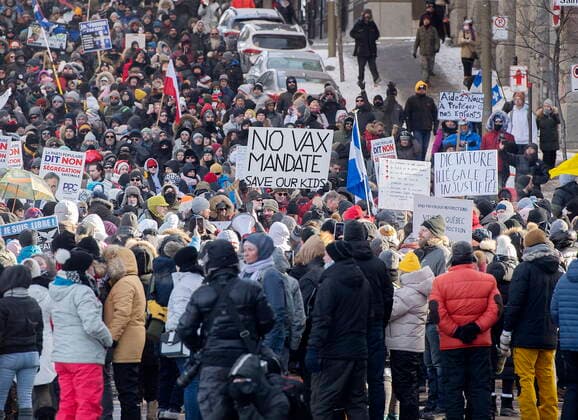 January 8, 2022, Montreal, PQ, Canada: People take part in a demonstration against the Quebec governmentöÄÃ s measures to curb the spread of COVID-19 in Montreal, Saturday, Jan. 8, 2022. Montreal Canada  - ZUMAc35_ 20220108_zaf_c35_042 Copyright: xGrahamxHughesx