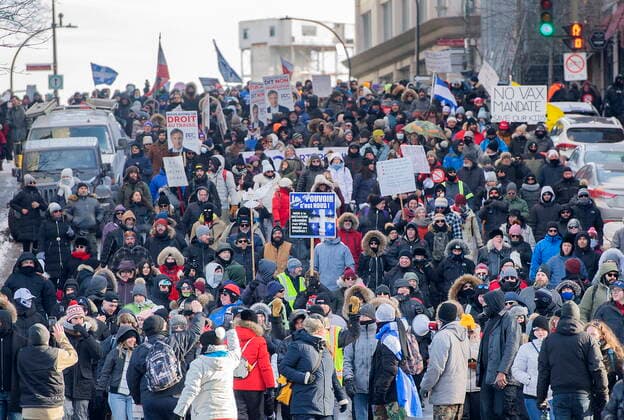 January 8, 2022, Montreal, PQ, Canada: People take part in a demonstration against the Quebec governmentöÄÃ s measures to curb the spread of COVID-19 in Montreal, Saturday, Jan. 8, 2022. Montreal Canada  - ZUMAc35_ 20220108_zaf_c35_044 Copyright: xGrahamxHughesx