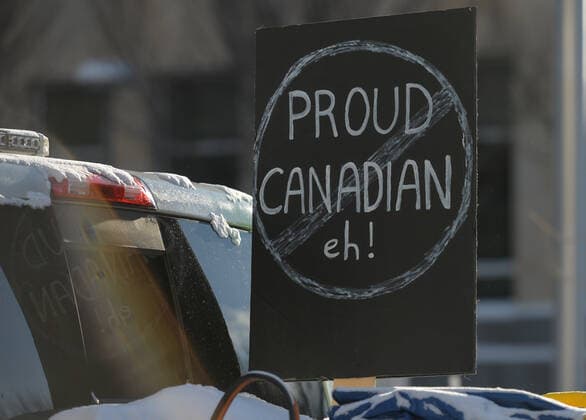 The Media Is The Virus Protest In Edmonton A placard with words Proud Canadian eh! attached to the car. Anti-lockdown and anti-vaccination activists meet in the parking lot next to the Alberta Legislature, ahead of the Stand United - The Media Is The Virus! Protest. against Global News, the news and current affairs unit of the Canadian Global Television Network in Edmonton. On Saturday, January 8, 2022, in Edmonton, Alberta, Canada. Edmonton Canada  Copyright: xArturxWidakx originalFilename: widak-themedia220108_npDIR.jpg