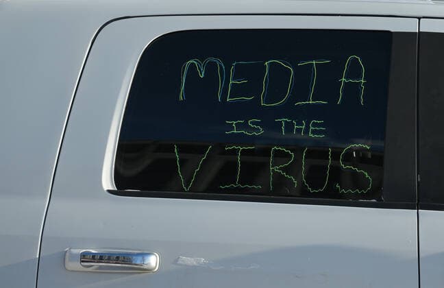 The Media Is The Virus Protest In Edmonton Media Is The Virus inscription on the window of the car. Anti-lockdown and anti-vaccination activists meet in the parking lot next to the Alberta Legislature, ahead of the Stand United - The Media Is The Virus! Protest. against Global News, the news and current affairs unit of the Canadian Global Television Network in Edmonton. On Saturday, January 8, 2022, in Edmonton, Alberta, Canada. Edmonton Canada  Copyright: xArturxWidakx originalFilename: widak-themedia220108_npP51.jpg