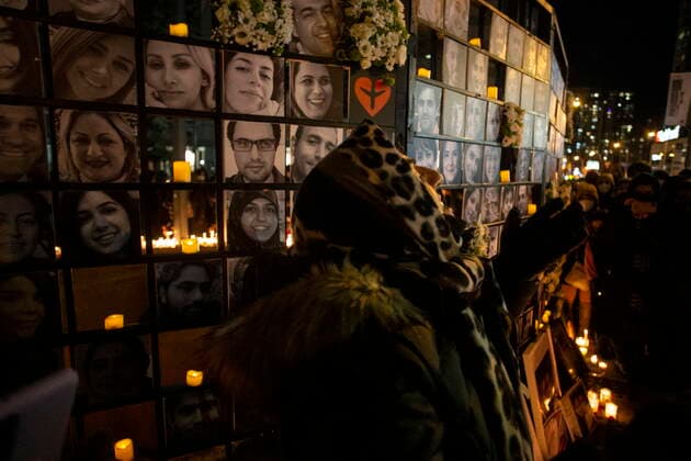 January 8, 2022, TORONTO, ON, Canada: A woman mourns at a vigil in Toronto on Saturday, January 8, 2022 in memory of the 176 victims of Ukraine International Airlines Flight PS752 that was shot down in Iranian forces two years ago. TORONTO Canada  - ZUMAc35_ 20220108_zaf_c35_130 Copyright: xChrisxYoungx