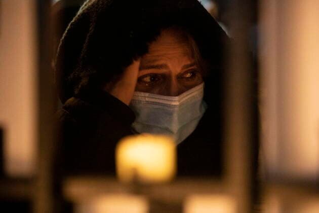 January 8, 2022, TORONTO, ON, Canada: A woman mourns at a vigil in Toronto on Saturday, January 8, 2022 in memory of the 176 victims of Ukraine International Airlines Flight PS752 that was shot down by Iranian forces two years ago. TORONTO Canada  - ZUMAc35_ 20220108_zaf_c35_137 Copyright: xChrisxYoungx