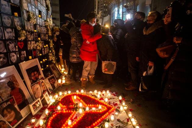 January 8, 2022, TORONTO, ON, Canada: Mourners gather at a vigil in Toronto on Saturday, January 8, 2022 in memory of the 176 victims of Ukraine International Airlines Flight PS752 that was shot down by Iranian forces two years ago. TORONTO Canada  - ZUMAc35_ 20220108_zaf_c35_144 Copyright: xChrisxYoungx