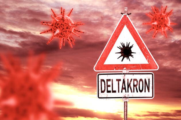 09 January 2022: Deltacron new covid-19 coronavirus mutant mutation of sars cov 2 virus a mixture of the delta and omicron variant, warning sign symbol delta cron