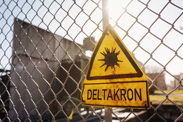 09 January 2022: Deltacron new covid-19 coronavirus mutant mutation of sars cov 2 virus a mixture of the delta and omicron variant, warning sign symbol delta cron