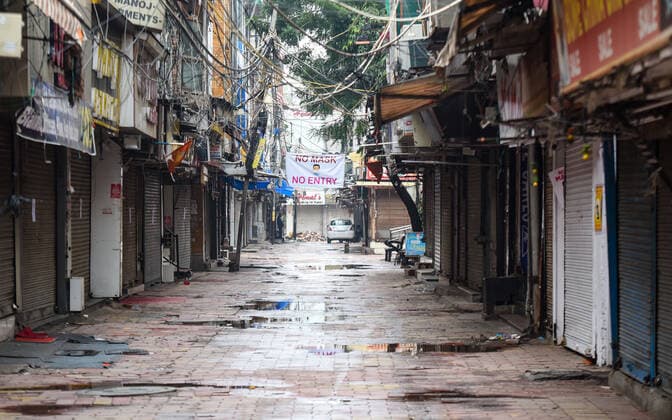 NEW DELHI, INDIA JANUARY 9: A deserted view of Lajpat Nagar market during the weekend curfew imposed by the Delhi government in wake of rising Covid-19 cases, on January 9 2022 in New Delhi, India. (Photo by Amal KS Hindustan Times ) Delhi Imposes Weekend Curfew To Curb Covid-19 Spread