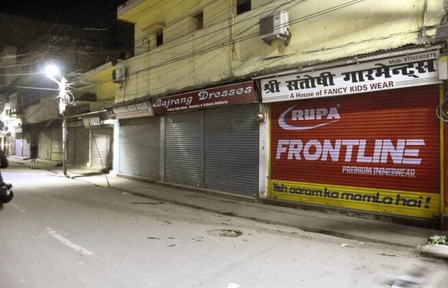 PATNA, INDIA JANUARY 9: A view of closed shops during night curfew imposed by state government amid the spread of Omicron variant of Covid-19 at Thakurbari road on January 9, 2022 in Patna, India. (Photo by Santosh Kumar Hindustan Times ) Daily Life Amid Coronavirus Pandemic In India