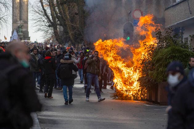 09 01 2022 , Brussels , Belgium , Thousands demonstrate against the governments corona measures in Belgium and against compulsory vaccination , light rioting after end of demonstration