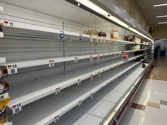 ALEXANDRIA, VA - JANUARY 9: View of empty shelves at a local Giant supermarket as the omicron covid variant causes widespread supply chain delays resulting in empty shelves in many food markets on January 9, 2022 in Alexandria, Virginia. Copyright: xmpi34x