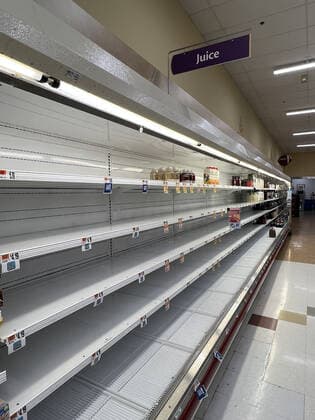 ALEXANDRIA, VA - JANUARY 9: View of empty shelves at a local Giant supermarket as the omicron covid variant causes widespread supply chain delays resulting in empty shelves in many food markets on January 9, 2022 in Alexandria, Virginia. Copyright: xmpi34x