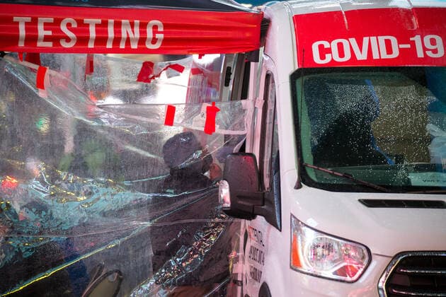 (220110) -- NEW YORK, Jan. 10, 2022 -- A person is swabbed at a COVID-19 testing site in Times Square in New York, the United States, Jan. 9, 2022. The total number of COVID-19 cases in the United States topped 60 million on Sunday, according to data from Johns Hopkins University. (Photo by Xinhua) U.S.-COVID-19-CASES-60 MILLION MichaelxNagle 