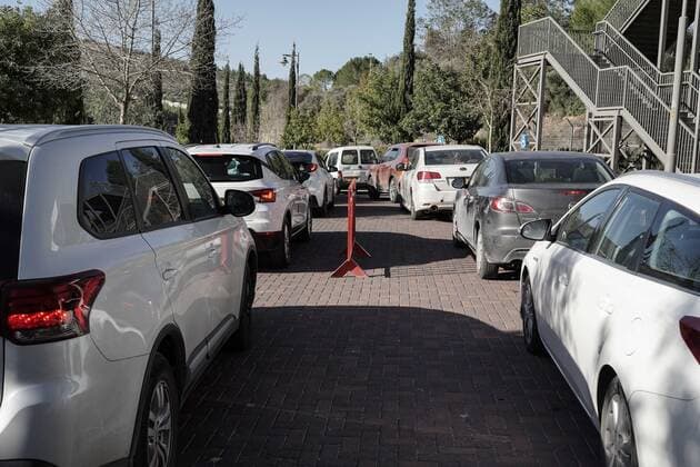 January 10, 2022, Jerusalem, Israel: Drivers queue for hours for COVID-19 tests at the Ein Yael drive thru complex in Jerusalem as Israel faces a surge in Coronavirus infection most likely due to the Omicron variant. Magen David Adom, IsraelÃ¢â‚¬â ¢s leading EMS, conducts PCR tests for the elderly and Antigen tests for all others as a shortage of PCR test kits threatens the near future. Although Antigen tests have proven significantly inaccurate providing both FALSE POSITIVE and FALSE NEGATIVE results, some of the countryÃ¢â‚¬â ¢s economy and education system relies on frequent testing for those not vaccinated. Jerusalem Israel - ZUMAa126 20220110_zap_a126_014 Copyright: xNirxAlonx