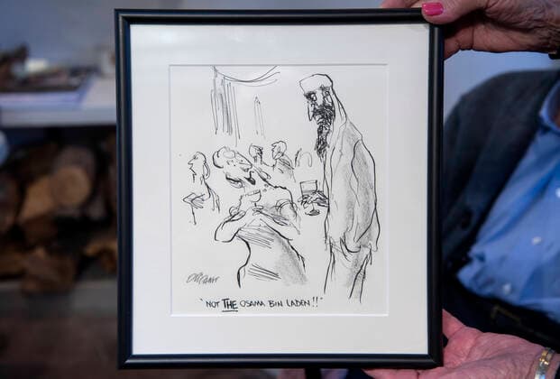 January 10, 2022, USA: A political cartoon by Pat Oliphant in a book at his home Santa Fe, Monday, January 10, 2021. USA - ZUMAab1_ 20220110_zaf_ab1_018 Copyright: xEddiexMoorex