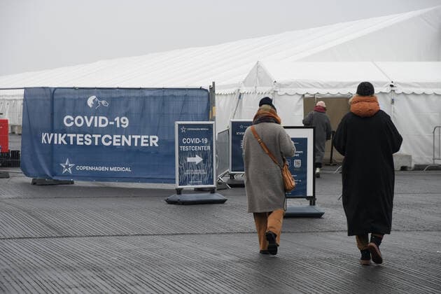 Copenhagen Denmark. 12 January 2021 People walk to Covid-19 quick test center in danish capital Copenhagen Denmark (Photo..Francis Joseph Dean Dean Pictures)
