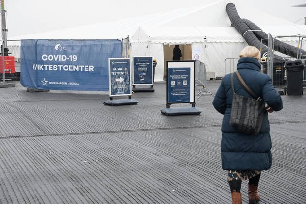 Copenhagen Denmark. 12 January 2021 People walk to Covid-19 quick test center in danish capital Copenhagen Denmark (Photo..Francis Joseph Dean Dean Pictures)