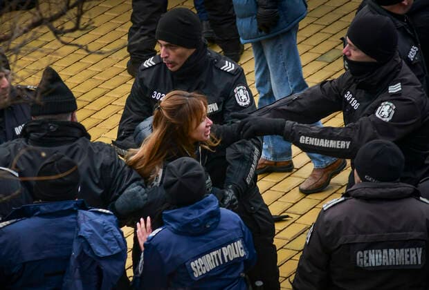 Protest Against Green Certificate And Vaccination Against COVID-19 In Bulgaria Protesters clash with police as they try to enter Bulgarian parliament buildingProtesters clash with police as they try to enter Bulgarian parliament building during protest against green certificates and vaccinations on January 12, 2022 in Sofia, Bulgaria. Bulgaria has lowest vaccination rate in European union as only 29% of population is vaccinated. Sofia Bulgaria  Copyright: xGeorgixPaleykovx originalFilename: paleykov-notitle220112_npv3c.jpg