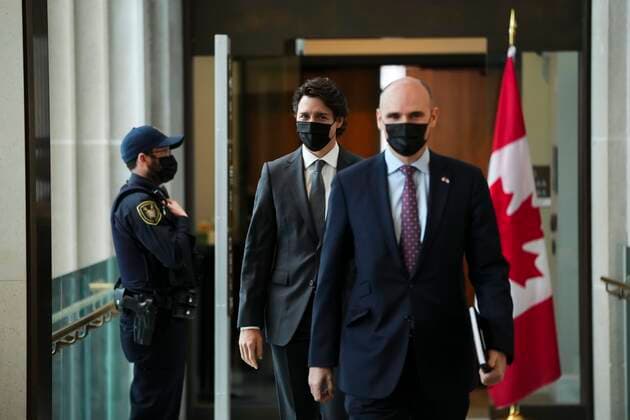 January 12, 2022, Ottawa, Ontario, CANADA: Prime Minister Justin Trudeau and Minister of Health Jean-Yves Duclos arrive to hold a press conference in Ottawa on Wednesday, Jan. 12, 2022. Ottawa CANADA  - ZUMAc35_ 20220112_zaf_c35_005 Copyright: xThexCanadianxPressx