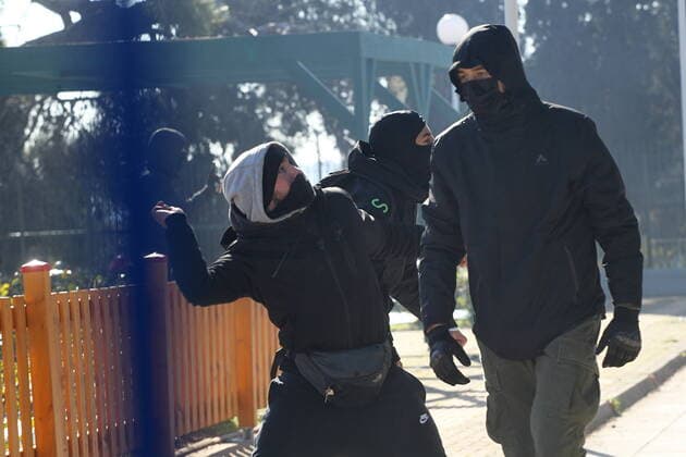 January 14, 2022, Athens, Greece: A few students throwed stones at the Education Ministry. Demonstration in the education sector against the health measures imposed by the government to fight COVID-19 in the schools. Athens Greece - ZUMAv62_ 20220114_zaf_v62_009 Copyright: xAristidisxVafeiadakisx