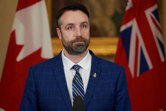 January 18, 2022, Winnipeg, MB, CANADA: Andrew Smith, Minister of Sport, Culture and Heritage, Minister Responsible for Manitoba Centennial Centre Corporation and Minister Responsible for Travel Manitoba, speaks to the media at a press conference after he is sworn-in at the Manitoba Legislative Building in Winnipeg, Manitoba, Tuesday January 18, 2022. Winnipeg CANADA  - ZUMAc35_ 20220118_zaf_c35_080 Copyright: xDavidxLipnowskix