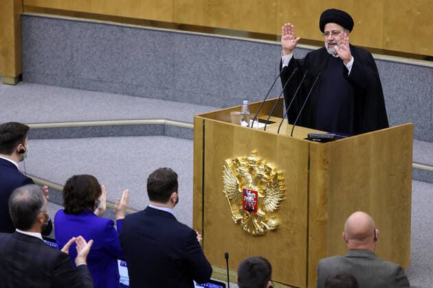 Bilder des Jahres 2022, News 01 Januar News Themen der Woche KW03 News Bilder des Tages MOSCOW, RUSSIA - JANUARY 20, 2021: Iran s President Ebrahim Raisi (background) addresses a meeting of the Russian State Duma. Anton Novoderezhkin TASS  TS11FC96