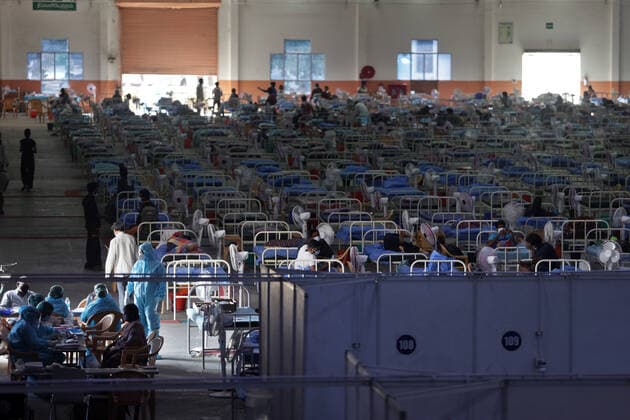 January 21, 2022, Chennai, Tamil Nadu, India: People suffering from Covid19 coronavirus disease are seen isolated inside the Chennai Trade Centre which is converted into a makeshift COVID-19 care center in Chennai. Chennai India - ZUMAl172 20220121_zip_l172_005 Copyright: xSrixLoganathanx