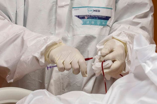 January 21, 2022, Rome, Italy: Health workers wearing overalls and protective masks in the intensive care unit of the Covid intensive care unit of the GVM ICC hospital of Casal Palocco near Rome, Italy, 21 January 2022. ANSA GIUSEPPE LAMI Rome Italy - ZUMAa110 20220121_zaf_a110_026 Copyright: xGiuseppexLamix