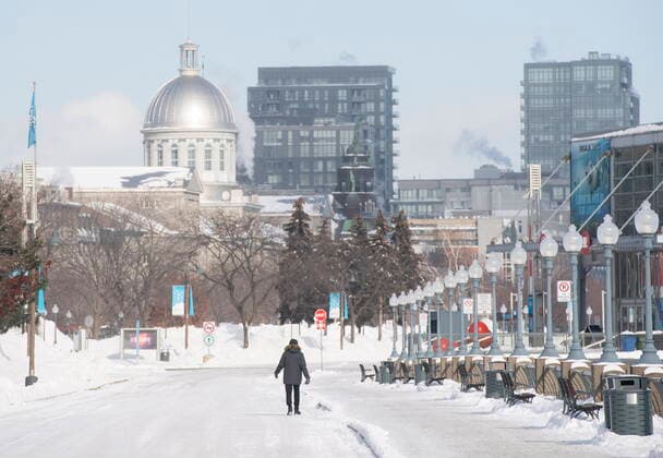 January 21, 2022, Montreal, PQ, Canada: A person walks along the promenade in the Old Port in Montreal, Friday, Jan. 21, 2022. Environment Canada has issued an extreme cold warning for the region. Montreal Canada  - ZUMAc35_ 20220121_zaf_c35_010 Copyright: xGrahamxHughesx