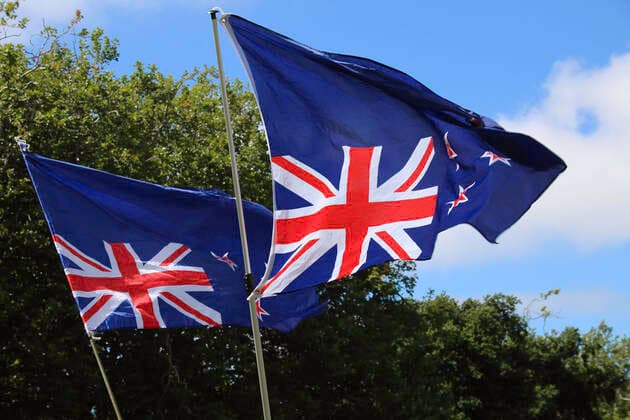 January 22, 2022, Christchurch, Canterbury, New Zealand: Inverted New Zealand flags were numerous during the antivax protest in Cranmer Square..Protesters take to the streets in the affluent suburb of Merivale in protest against the mandatory Covid19 vaccination. Christchurch New Zealand - ZUMAs197 20220122_zaa_s197_020 Copyright: xAdamxBradleyx