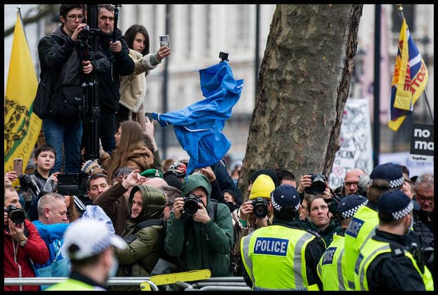 . 22 01 2022. London, United Kingdom. Anti Vax Protest at the BBC. NHS Uniforms are thrown at the gates of Downing Street during protest by anti vaxers including the group calling themselves Alpha Men Assemble in Whitehall, London  xMartynxWheatleyx xi-Imagesx IIM-23031-0037