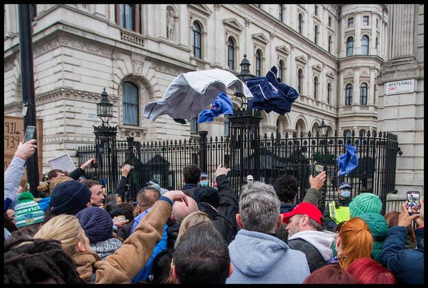 . 22 01 2022. London, United Kingdom. Anti Vax Protest at the BBC. NHS Uniforms are thrown at the gates of Downing Street during protest by anti vaxers including the group calling themselves Alpha Men Assemble in Whitehall, London  xMartynxWheatleyx xi-Imagesx IIM-23031-0048