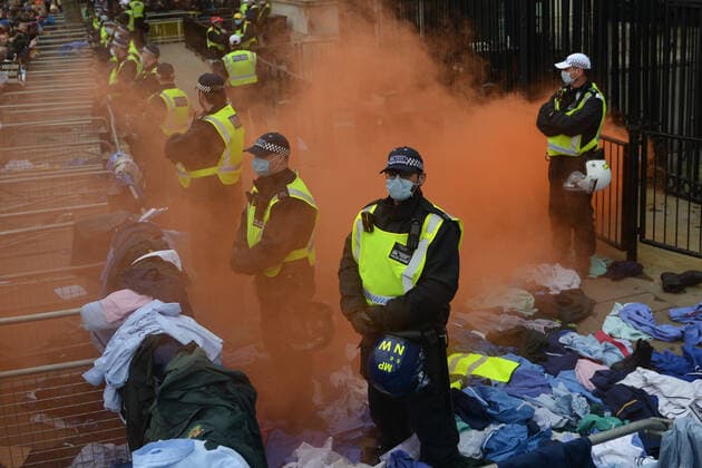 . 22 01 2022. London, United Kingdom. Protesters throw flares and NHS clothing during a freedom rally outside Downing Street in London.  xHowardxJonesx xi-Imagesx IIM-23033-0006