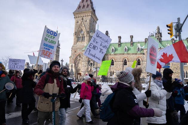 January 22, 2022, Ottawa, ON, CANADA: Demonstrators march in protest against public health measures taken by authorities to curb the spread of COVID-19, in Ottawa, Saturday, Jan. 22, 2022. Ottawa CANADA  - ZUMAc35_ 20220122_zaf_c35_013 Copyright: xMichaelxChisholmx