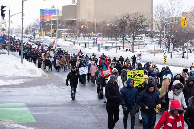 January 22, 2022, Ottawa, ON, CANADA: Demonstrators march in protest against public health measures taken by authorities to curb the spread of COVID-19, in Ottawa, Saturday, Jan. 22, 2022. Ottawa CANADA  - ZUMAc35_ 20220122_zaf_c35_016 Copyright: xMichaelxChisholmx
