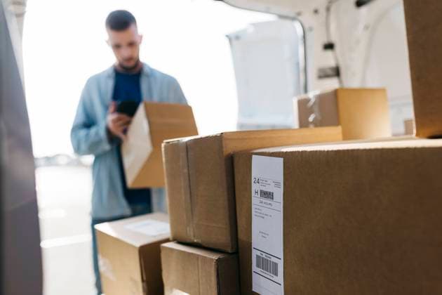 Brown packages arranged in van model released property released, JRFF05203