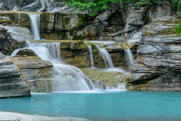 Water flowing from mountain stream into lake at Vanoise National Park, France, ANSF00202