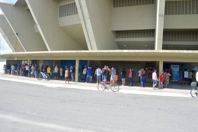 January 24, 2022, Natal, Rio Grande do Norte, Brazil: Movement at the premises of the second Center for Combating Influenza Syndromes and Covid-19, at Ginasio Nelio Dias, as set up by the Natal City Hall to meet the great demand of patients with flu symptoms, this Monday (24). The Center has doctors, medicines and tests to make an accurate diagnosis of the disease. In addition to welcoming, risk classification, medical consultation, rapid tests for covid, stabilization and referral, when necessary, to another point of care, such as the Emergency Care Units, which are receiving cases with more severe symptoms. Copyright: xJosexAldenirx