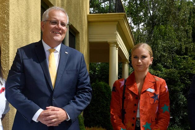 2022 AUSTRALIAN OF THE YEAR AWARDS MORNING TEA, Prime Minister Scott Morrison and 2021 Australian of the Year Grace Tame during a morning tea for state and territory recipients in the 2022 Australian of the Year Awards at The Lodge in Canberra, Tuesday, January 25, 2022. ( NO ARCHIVING, EDITORIAL USE ONLY, NO USE IN BOOKS WITHOUT CONSENT CANBERRA ACT AUSTRALIA  Copyright: xMICKxTSIKASx 20220125001616760714