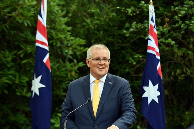 2022 AUSTRALIAN OF THE YEAR AWARDS MORNING TEA, Prime Minister Scott Morrison speaks during a morning tea for state and territory recipients in the 2022 Australian of the Year Awards at The Lodge in Canberra, Tuesday, January 25, 2022. ( NO ARCHIVING, EDITORIAL USE ONLY, NO USE IN BOOKS WITHOUT CONSENT CANBERRA ACT AUSTRALIA  Copyright: xMICKxTSIKASx 20220125001616760808