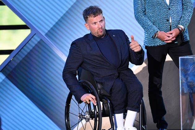 2022 AUSTRALIAN OF THE YEAR AWARDS, Victoria?s Australian of the Year Dylan Alcott on stage with the other nominees during the 2022 Australian of the Year Awards ceremony, at the National Arboretum in Canberra, Tuesday, January 25, 2022. ( NO ARCHIVING, EDITORIAL USE ONLY, NO USE IN BOOKS WITHOUT CONSENT CANBERRA ACT AUSTRALIA  Copyright: xMICKxTSIKASx 20220125001616859537