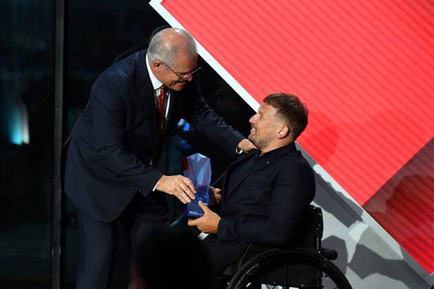 2022 AUSTRALIAN OF THE YEAR AWARDS, Prime Minister Scott Morrison and 2022 Australian of the Year winner Dylan Alcott during the 2022 Australian of the Year Awards ceremony, at the National Arboretum in Canberra, Tuesday, January 25, 2022. ( NO ARCHIVING, EDITORIAL USE ONLY, NO USE IN BOOKS WITHOUT CONSENT CANBERRA ACT AUSTRALIA  Copyright: xMICKxTSIKASx 20220125001616864456