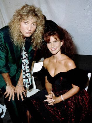 David Coverdale of hard rock band Whitesnake and Tawny Kitaen photographed backstage in 1988 Copyright: xRonxWolfsonx xRockxNegativesx xMediaPunchx