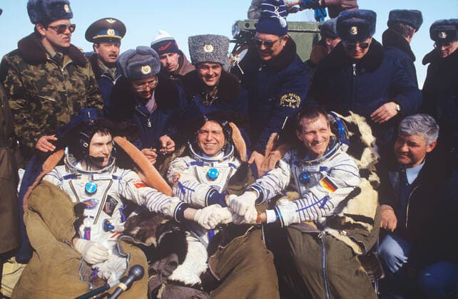 Sergei Krikalev, Alexander Volkov and Klaus Dietrich Flade 1043438 25.03.1992 The 10th expedition to the station Mir . Cosmonauts Sergei Krikalev, Alexander Volkov and cosmonaut-researcher of Germany Klaus-Dietrich Flade (left to right) after landing in Kazakhstan, March 25, 1992. Igor Mikhalev Sputnik Kazakhstan  Copyright: xIgorxMikhalevx