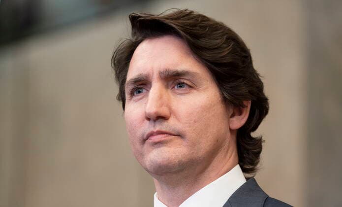 January 26, 2022, Ottawa, ON, Canada: Canadian Prime Minister Justin Trudeau listens to a question during a media availability after a cabinet retreat, Wednesday, Jan. 26, 2022 in Ottawa. Trudeau says Canada is extending its mission to train Ukrainian soldiers by three years. Ottawa Canada  - ZUMAc35_ 20220126_zaf_c35_015 Copyright: xAdrianxWyldx
