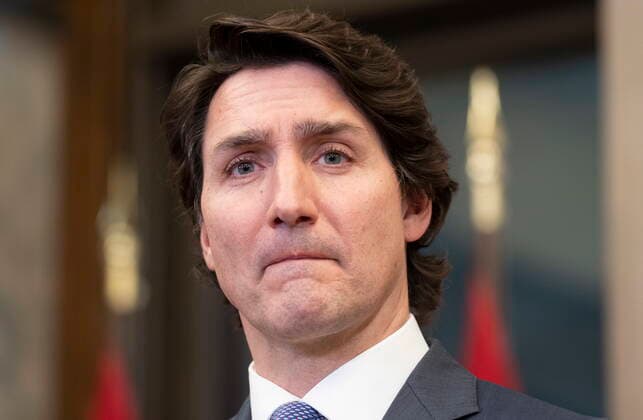 January 26, 2022, Ottawa, ON, Canada: Canadian Prime Minister Justin Trudeau listens to a question as he speaks with the media following a cabinet retreat, Wednesday, Jan. 26, 2022 in Ottawa. Trudeau says Canada is extending its mission to train Ukrainian soldiers by three years. Ottawa Canada  - ZUMAc35_ 20220126_zaf_c35_030 Copyright: xAdrianxWyldx