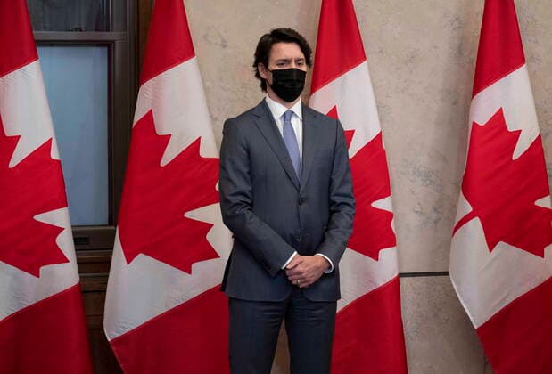January 26, 2022, Ottawa, ON, Canada: Canadian Prime Minister Justin Trudeau listens to a minister speak during a media availability following a cabinet retreat, Wednesday, Jan. 26, 2022 in Ottawa. Ottawa Canada  - ZUMAc35_ 20220126_zaf_c35_032 Copyright: xAdrianxWyldx
