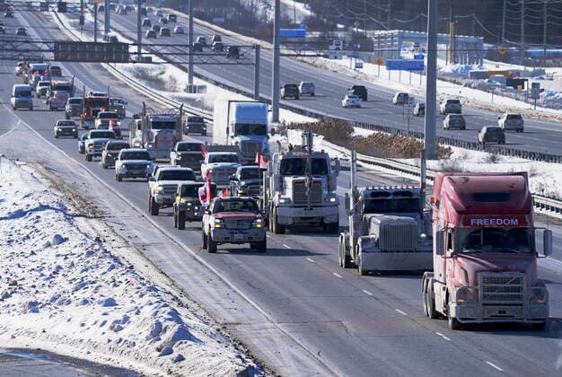 January 29, 2022, Ottawa, ON, Canada: A trucker convoy driving to Parliament Hill in Ottawa to participate in a cross-country truck convoy protesting measures taken by authorities to curb the spread of COVID-19 and vaccine mandates makes it s way on the highway near Kanata, Ont. on Saturday, Jan. 29, 2022. Ottawa Canada  - ZUMAc35_ 20220129_zaf_c35_097 Copyright: xFrankxGunnx